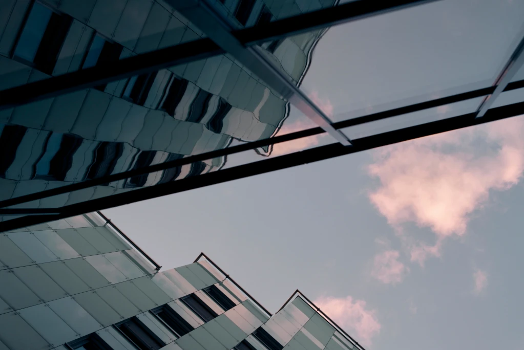 Data visualizations and charts representing commercial real estate market intelligence and debt restructuring trends.