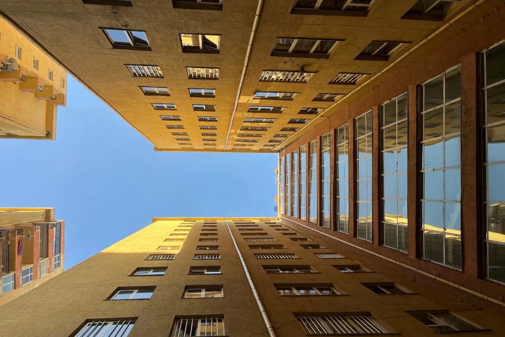 Official legal scales or document icon representing Acreboard’s institutional real estate strategy disclosures.